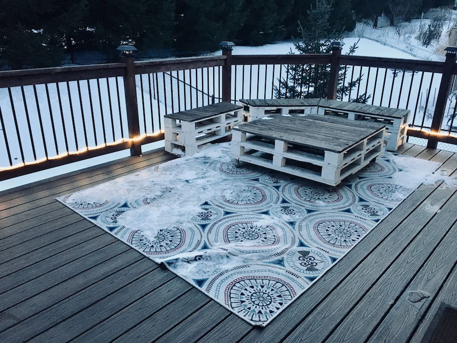 Huge deck overlooking fenced in backyard