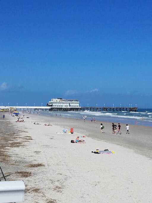 A 5 minute walk on the beach to the boardwalk