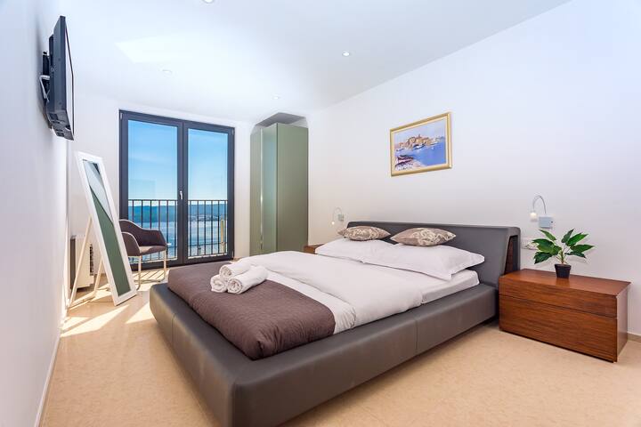 Bedroom No2 with King size bed 180x200cm with opened sea and pool views, A/C, TV
