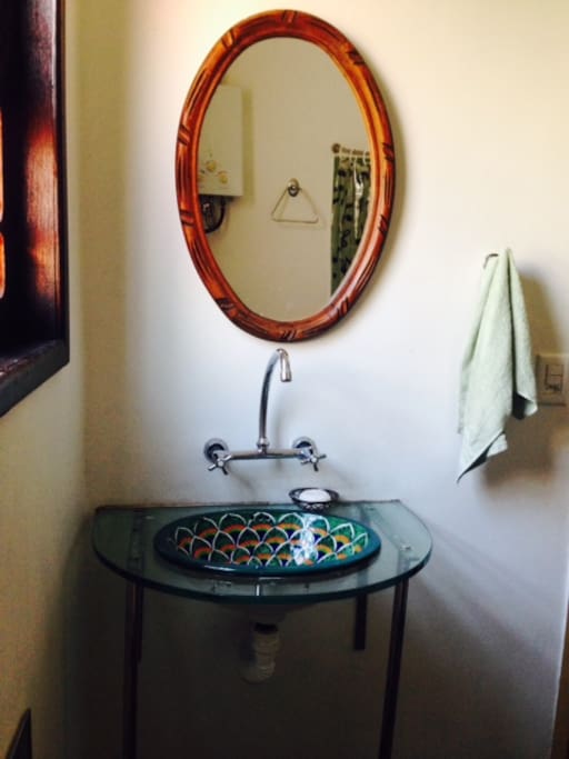 Bathroom with beautiful handprinted Mexican sink