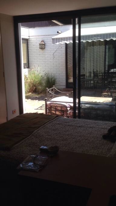 Private room with double bed and direct access to the bbq terrace.