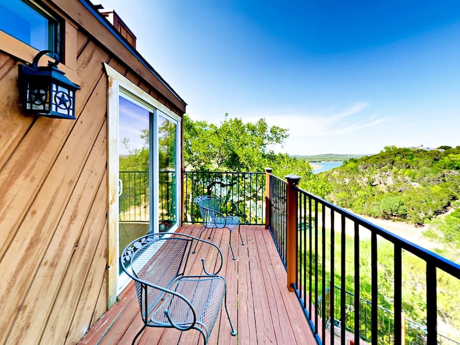The balcony offers sweeping views and seating for 2.