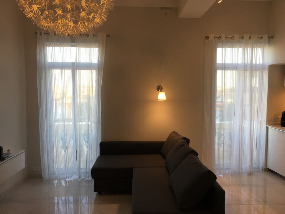 Living room with bed sofa.