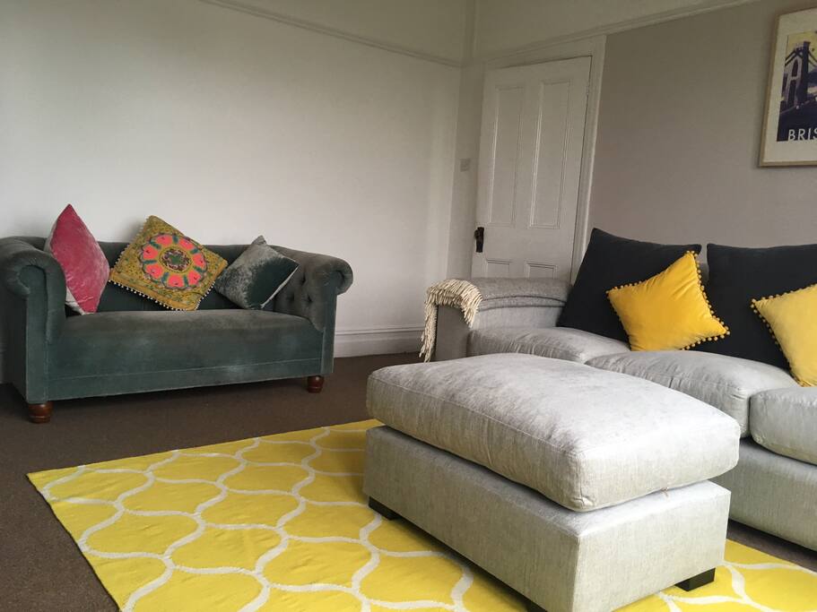 Large living room with plenty of seating.