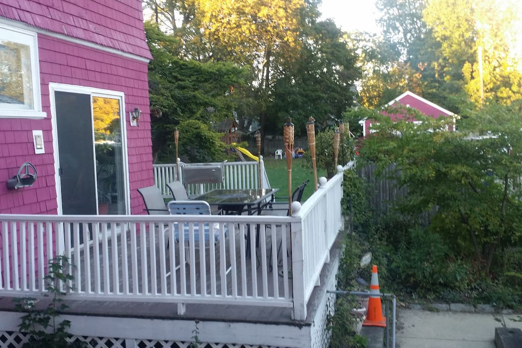 side view deck of backside and entrance to kitchen