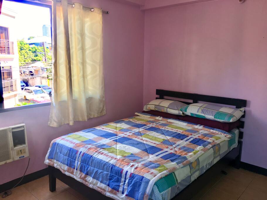 Queen Sized Bed with extra mattress for extra guest