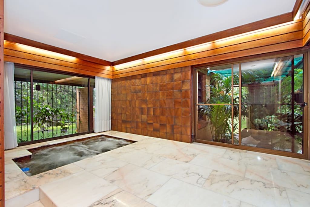 Our large heated spa is so relaxing. Chat over a glass of wine whilst watching kangaroos munch on the grass. This marble bathroom really takes you back to the 60's and is equipped with a shower, kids bath (with shower head), separate toilet and bidet.