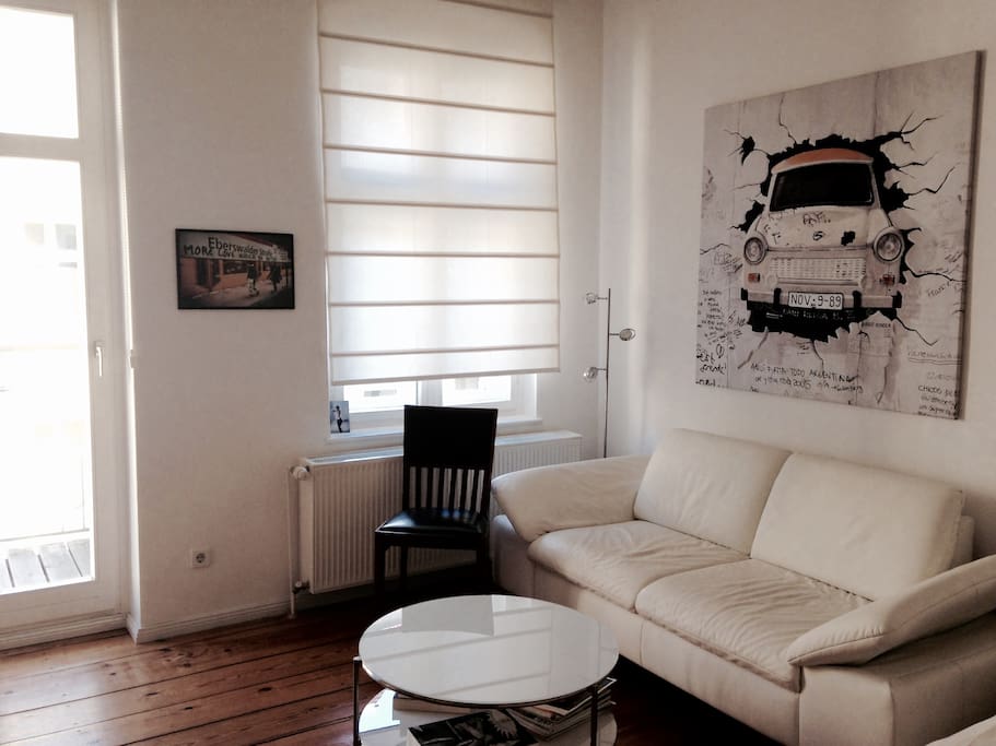 Couch area and door to the balcony