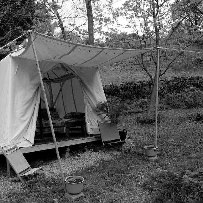 OUTSIDE THE TENT