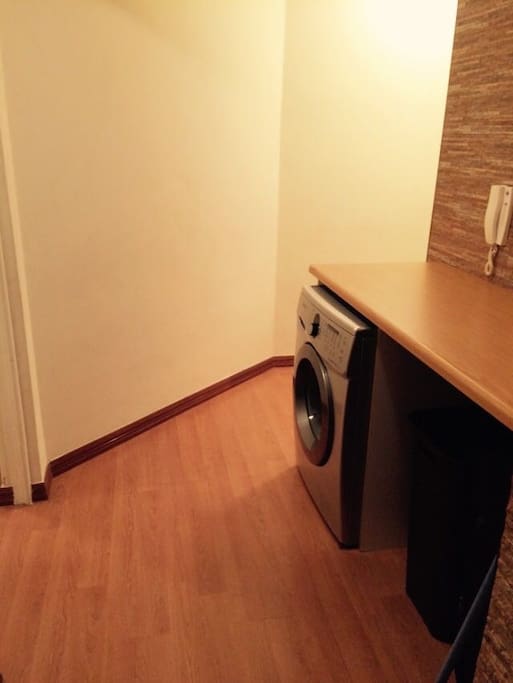 The apartment is fitted with a washer & dryer.