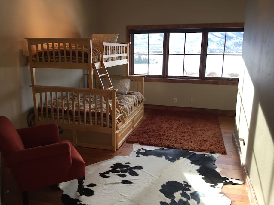 Bunk beds. Full over queen with a queen trundle bed.
