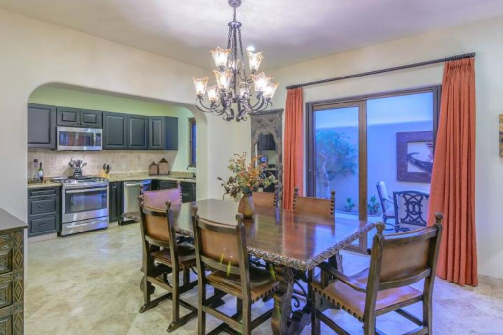 The dining table of 6 with another table for 4 just out the door