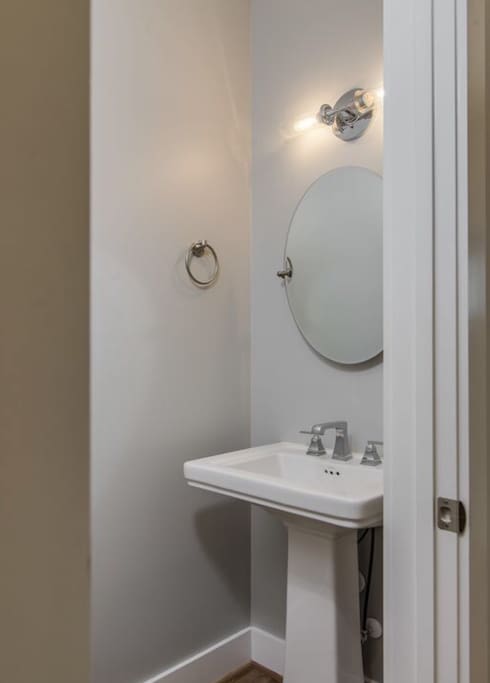 Downstairs half bath in main hallway.