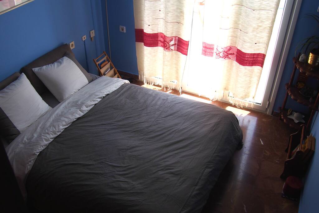 Bedroom with new bed and TV
