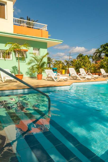 Zonas comunes: Terrazas, piscinas y jardín