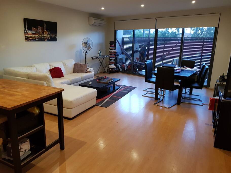 Living room, balcony and dining area