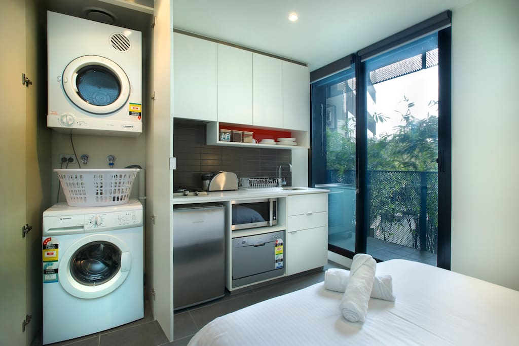 Washing and dryer are available. Fully equipped with kitchen and cooking amenities.