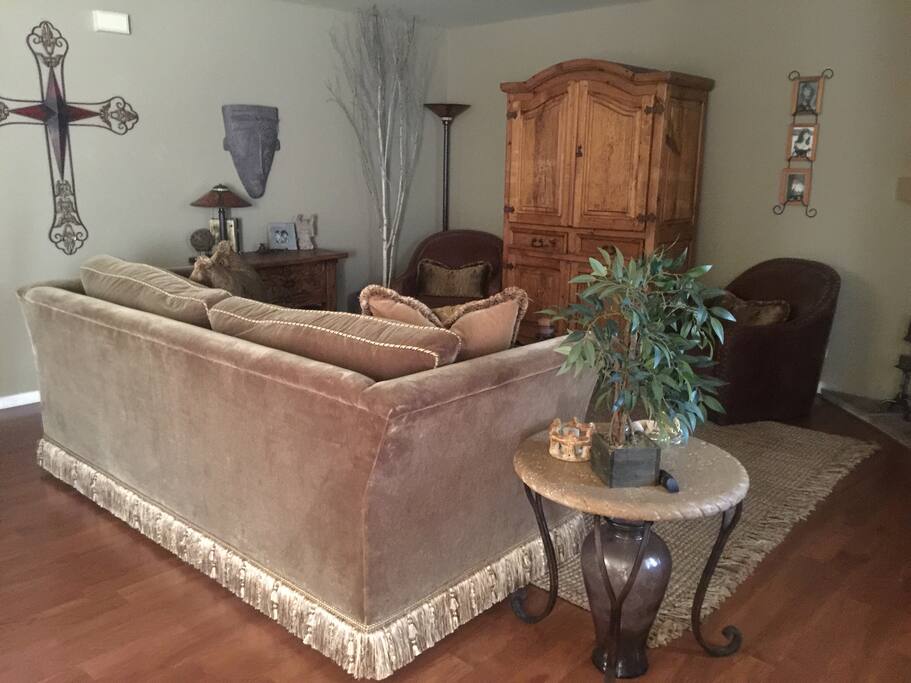 Real velvet couch with feather cushions… Make for your comfort while watching the big screen 47 in TV
