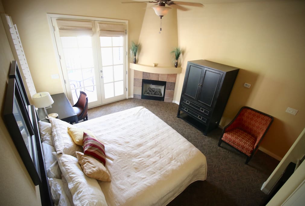 Spacious Master Suite has its own wetbar and microwave. TV inside armoire.