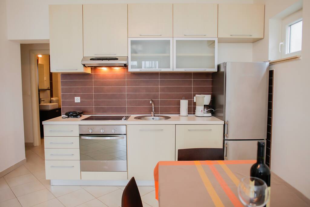 a kitchen and a dining area