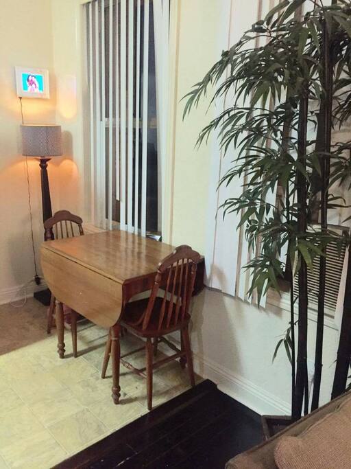 EXPANDABLE TABLE FOR 2-4 GUESTS BY WINDOW