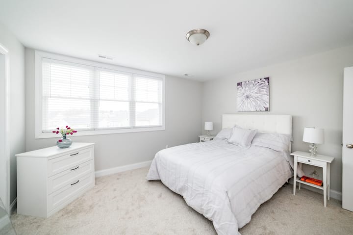 Upstairs Bedroom #1: queen bed, dresser, large closet, and recliner.