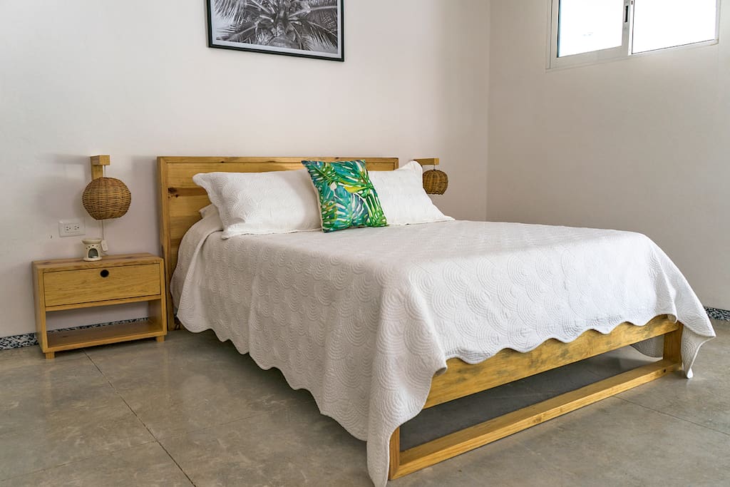 The studio includes a queen bed and a futon.