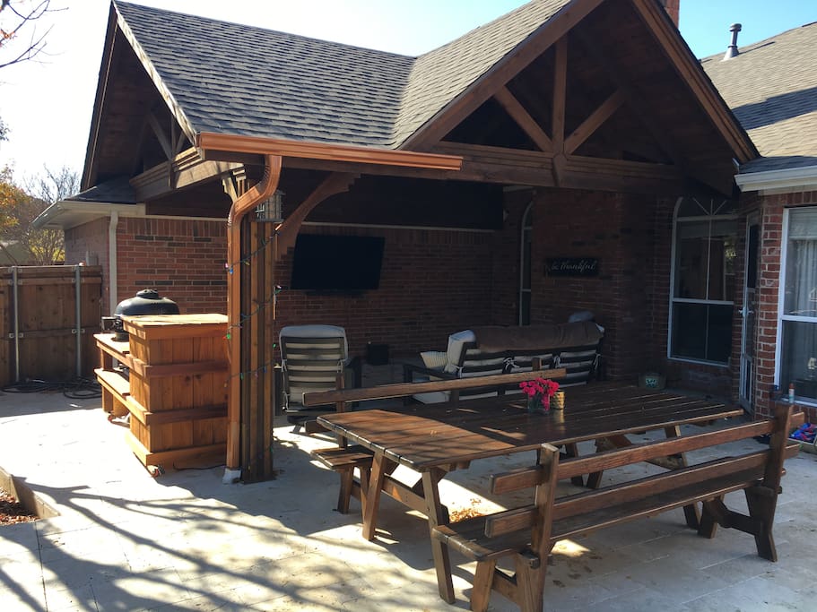Family style picnic table and our outdoor living area.