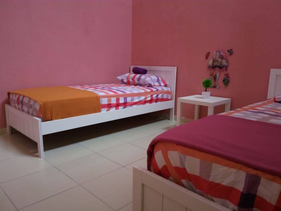 2nd room with 2 single beds
