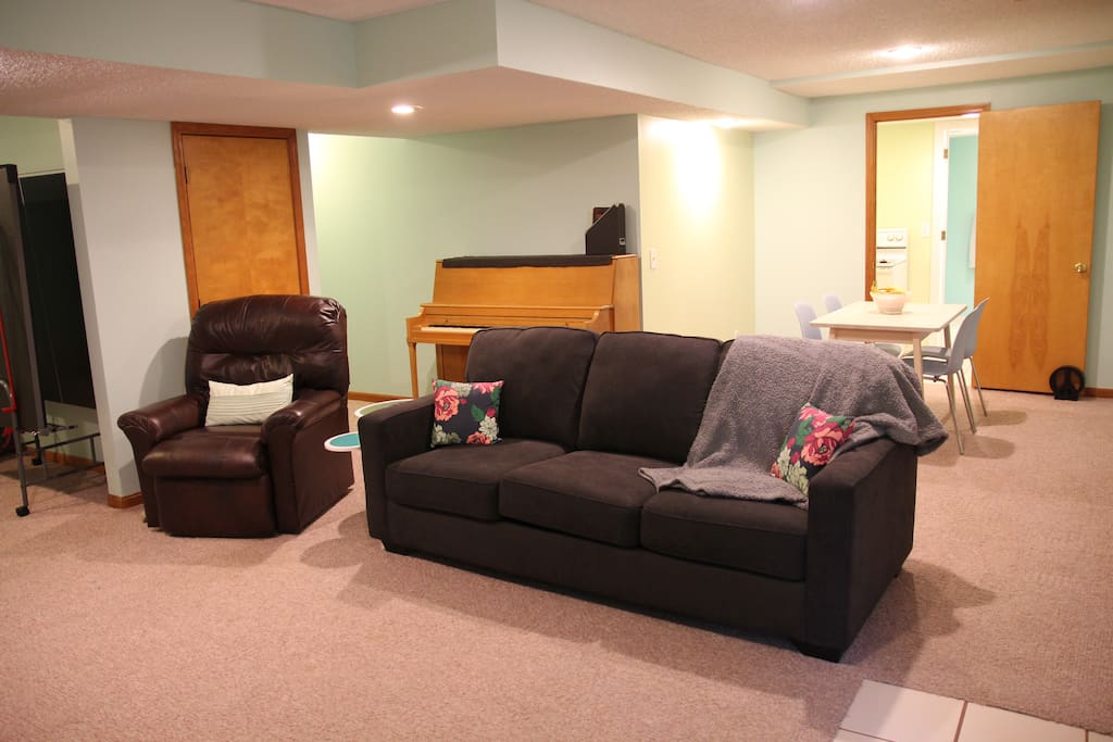 Queen-sized sleeper sofa located in open-concept living space.