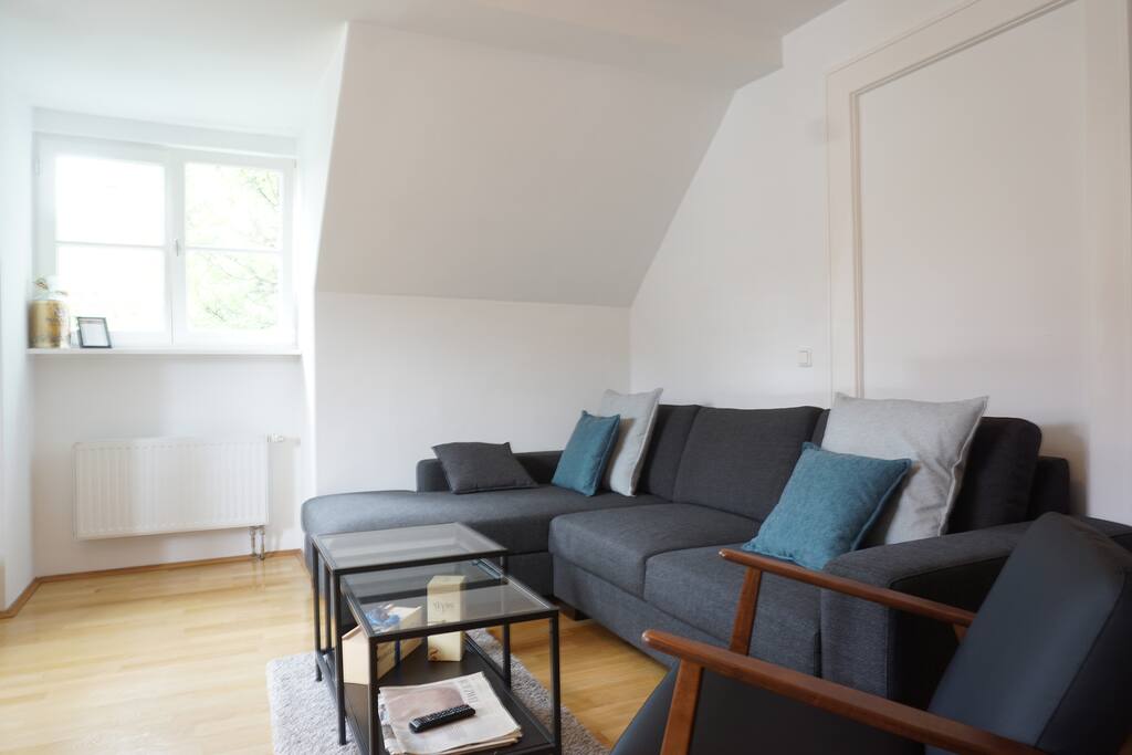 The big windows light up the room that creates the warm and cozy atmosphere.