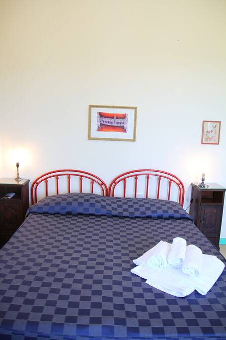 The Bedroom: the comfortable double bed with soft bed-linen and towels