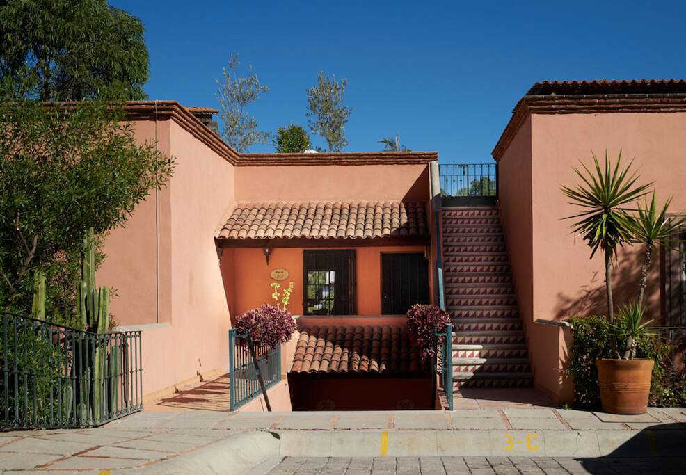 This is what you'll see when you arrive at Casa Juanita. The master bedroom is to the left. That staircase leads to the roof deck. More about that later.