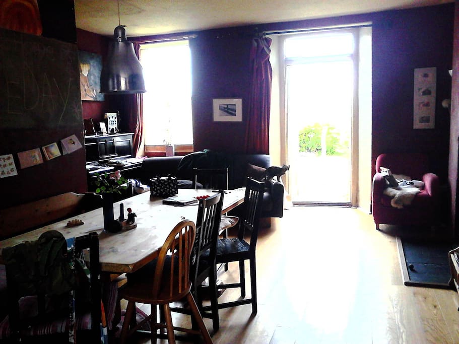 kitchen/dining room with doors out to front garden