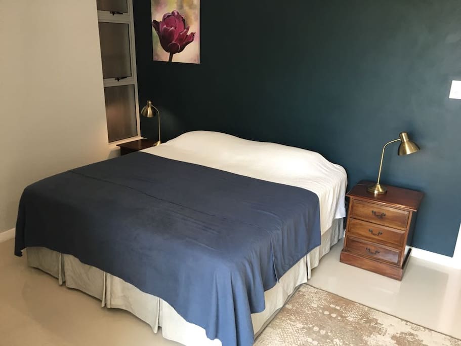 2 firm single beds made up as King