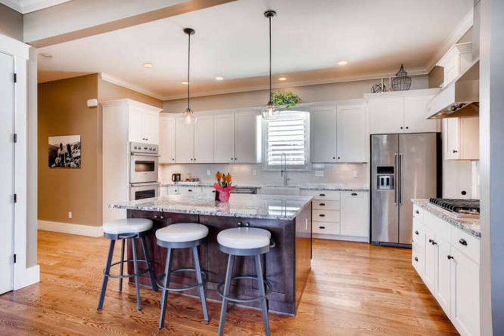Spacious gourmet kitchen includes coffee/tea, toast & granola bars.