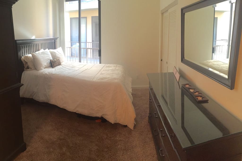 Second bedroom featuring full size pillow top mattress.