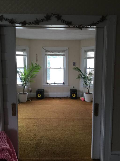 Large bright empty space used as a yoga studio when not hosting guests. Guests using this room need to bring own sleep accommodations.