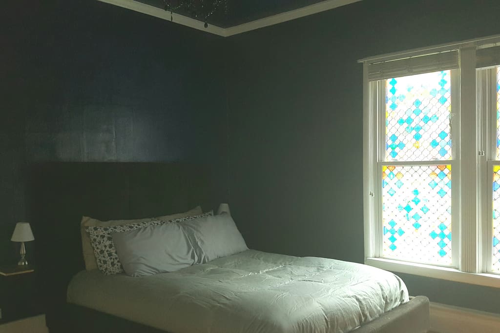 Bedroom with south-facing privacy window