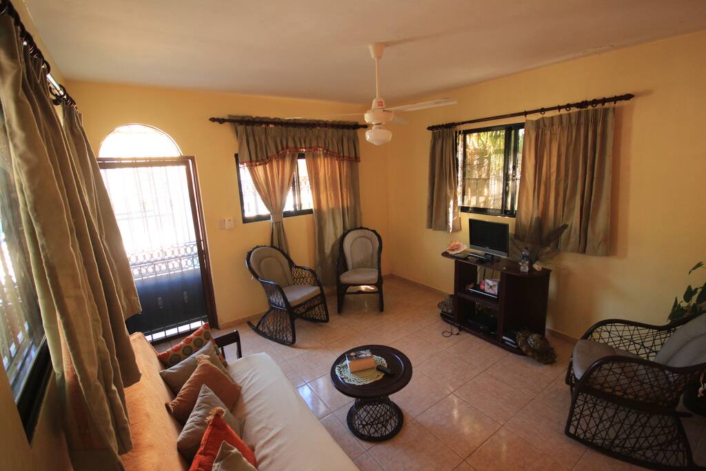 Living room which can be converted in a fourth room.