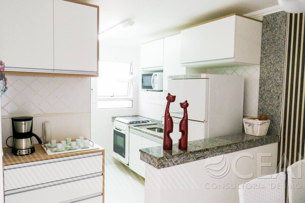 Cozinha integrada com a sala de jantar