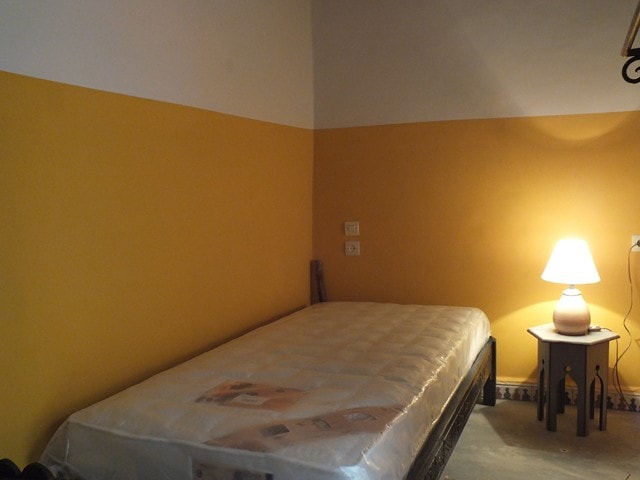 slaapkamer beneden met twee eenpersoonsbedden