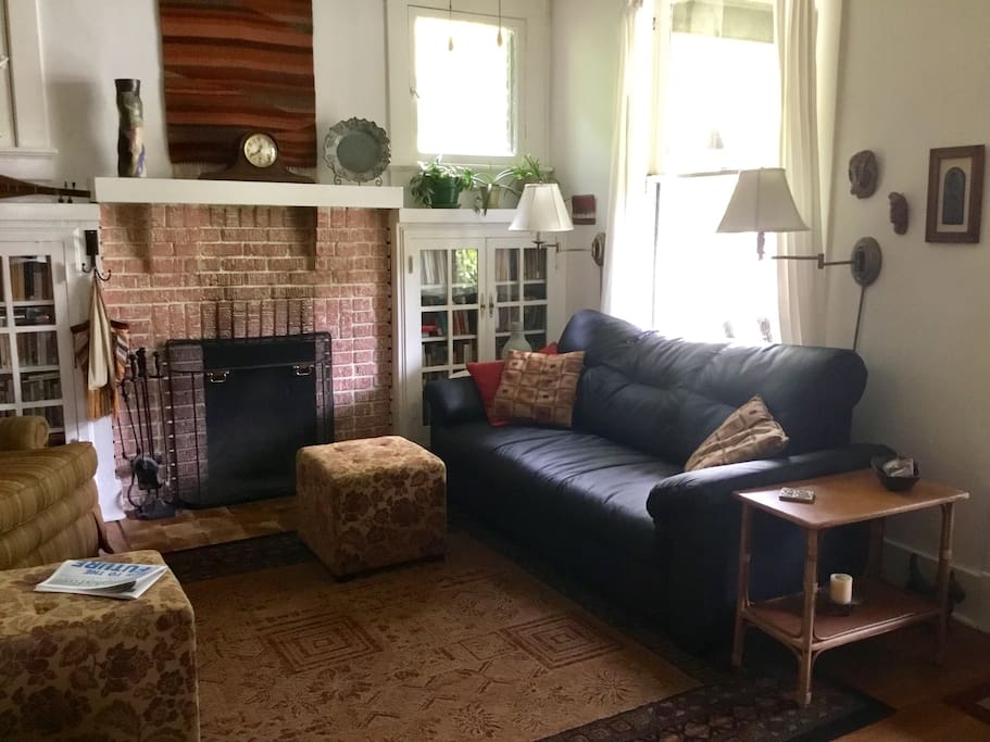 Living room with wood burning fireplace