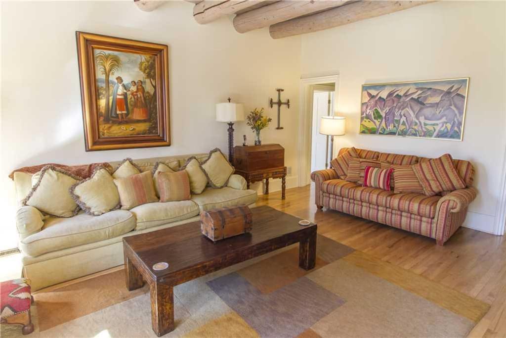 Luxury and Comfort - Plush leather seating paired with rich decor causes the family room to embody both luxury design and cozy re