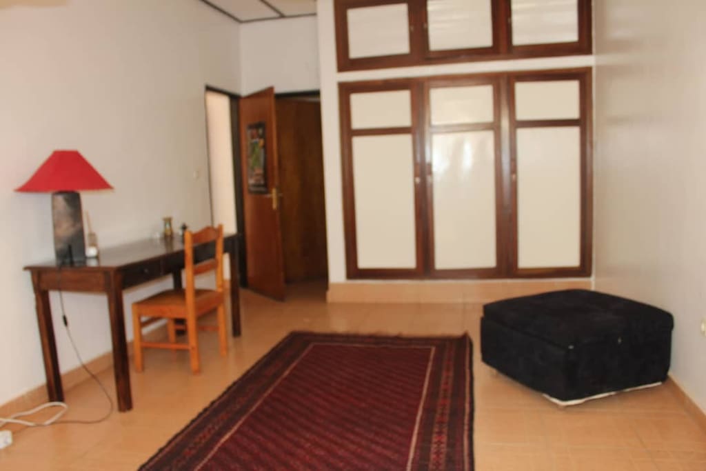 desk, wardrobe and bathroom access