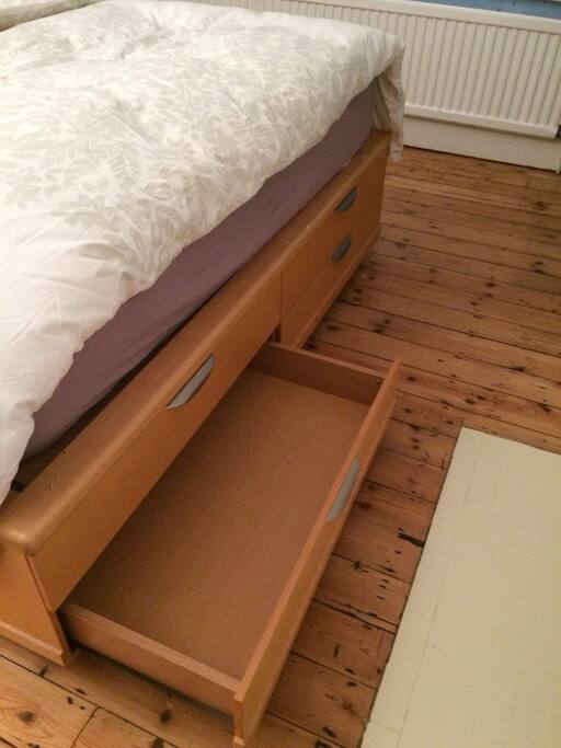 Storage drawer in bed