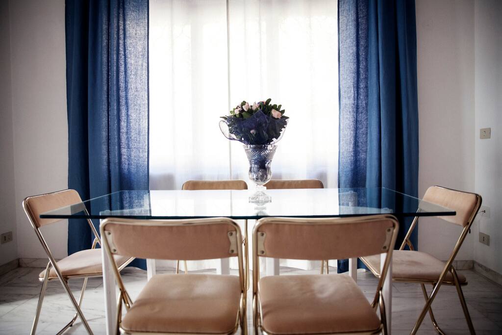 The dining table sits 6+