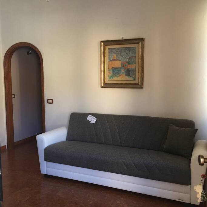 Sala con divano letto matrimoniale