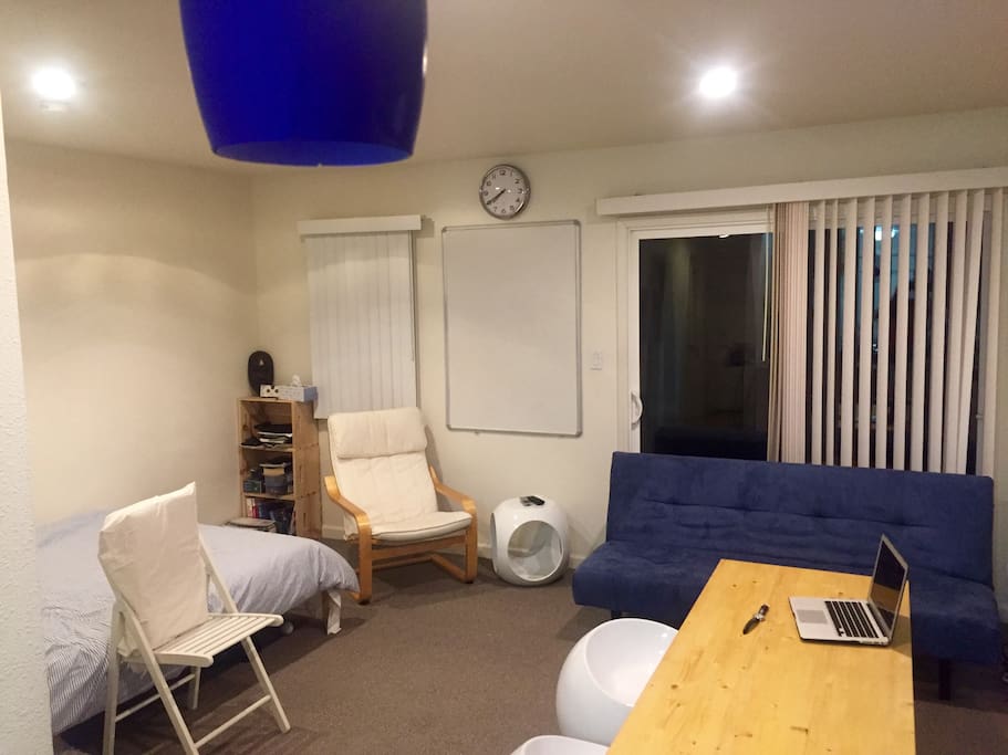 Full-size bed, comfy chair and whiteboard for any gametime strategizing!