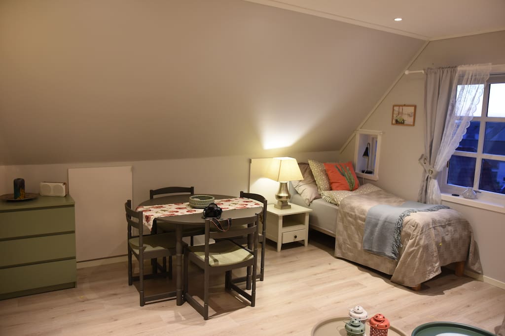 living room with 2 beds and sofa bed